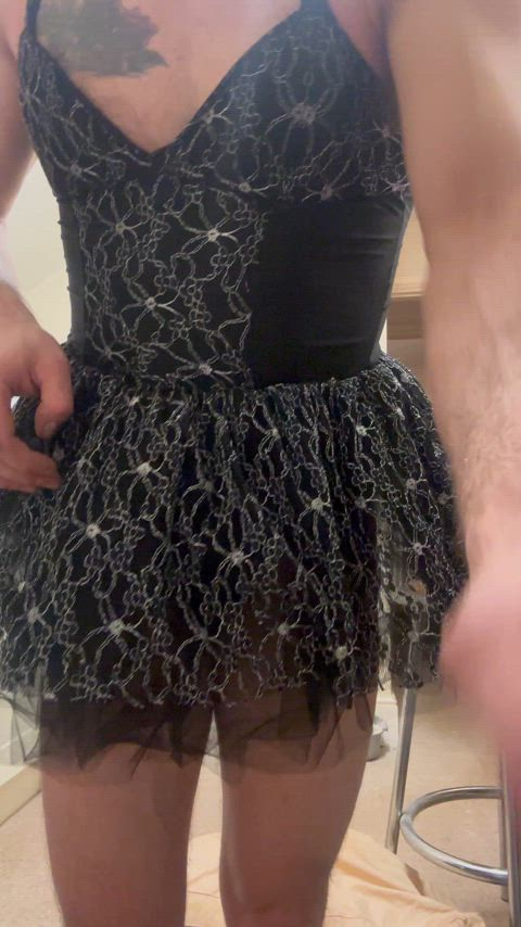 Wearing an Ann Summers mini dress with a thong on while playing with my arse