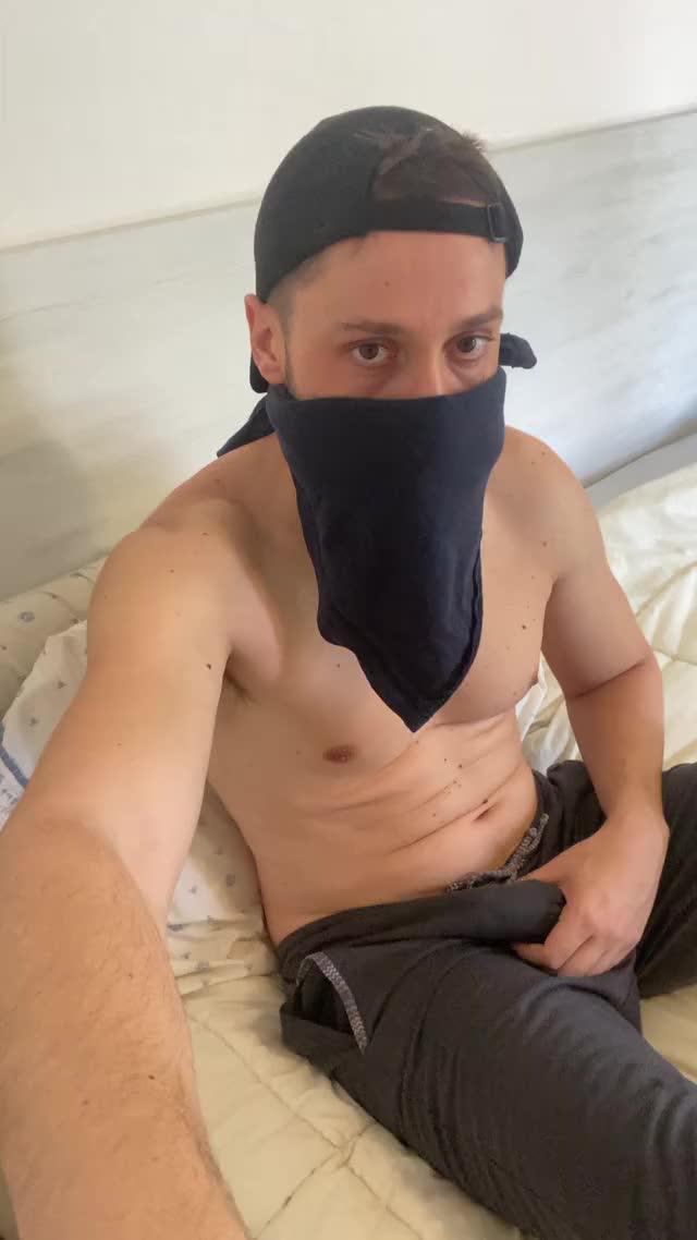 In preparation, with the gun loaded.