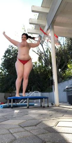 Mommy bouncing on the trampoline