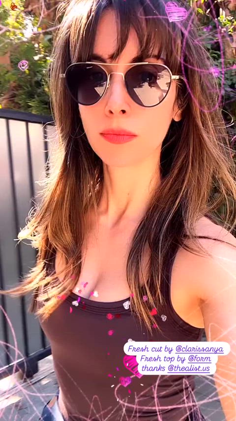 Alison Brie, walking down the street