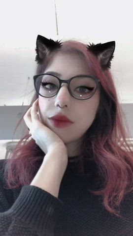 Kitten in glasses blowing you a kiss