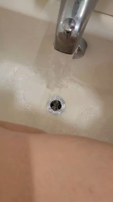 Washing my dirty feet in the tub.