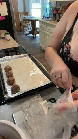 Portioning these homemade Parmesan, Onion, & Spinach Meatballs. Or POS Balls