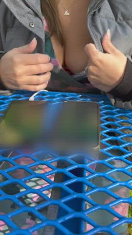 Nipple out in busy park (f)