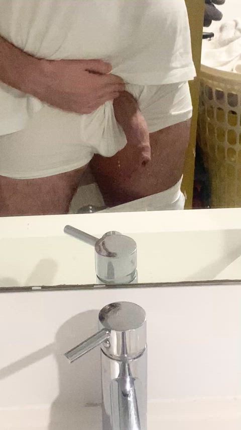 Playing with my flaccid cock