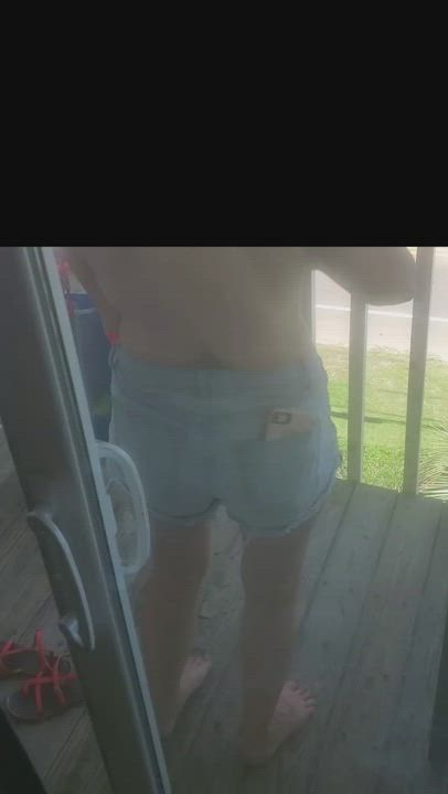 Topless on Balcony