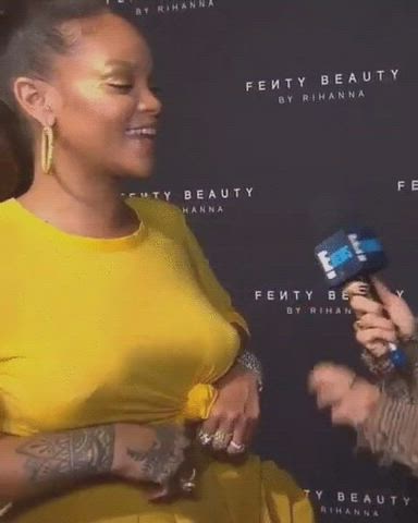 Rihanna's big braless tits