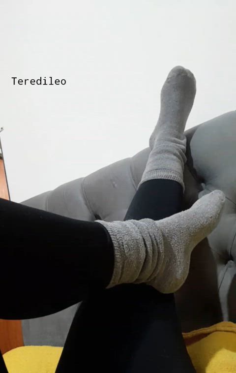 My feet with their socks caressing you