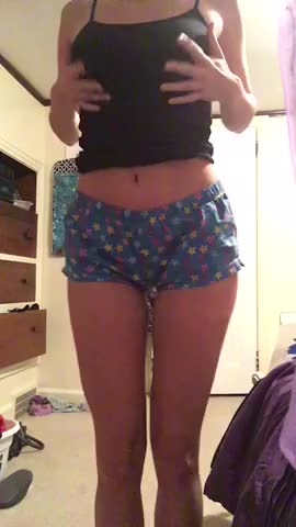 Busty teen strips