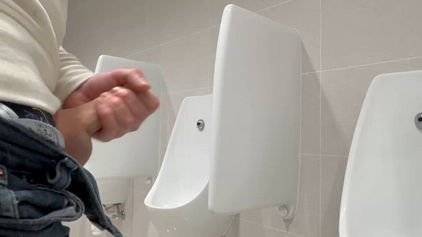 Cumshot in public toilets