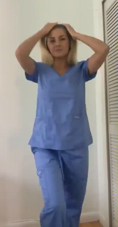 Beautiful blonde nurse strips off her clothes and bends over